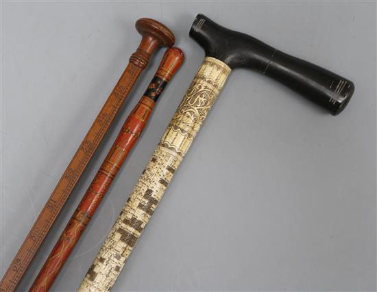 A carved bone walking stick, a red lacquer stick, a wine measure and a mask